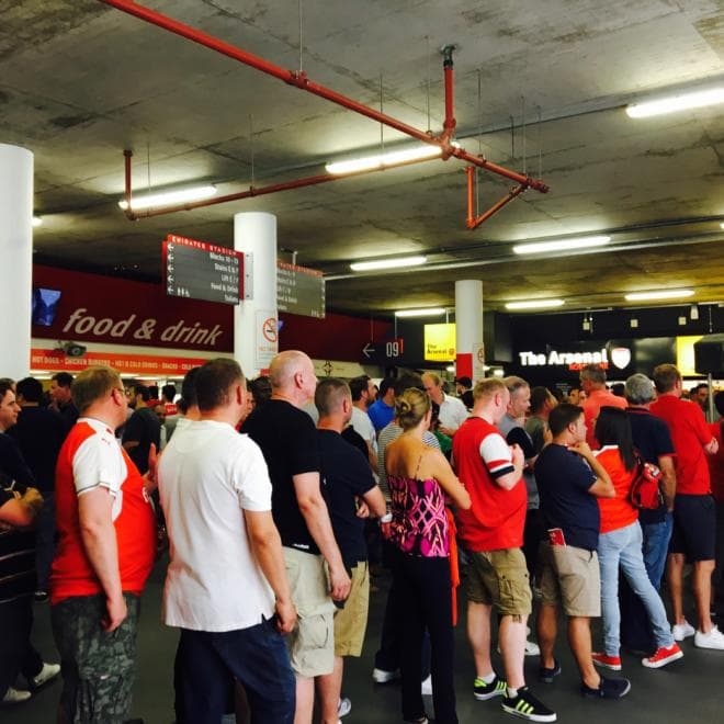 Thirsty Arsenal fans drown their sorrows at halftime against Liverpool